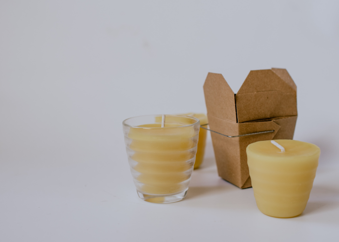 Beeswax candles in a glass candleholder