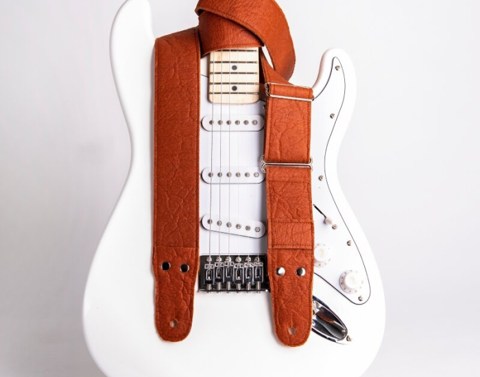 White Rock 'n Soul bass guitar with brown pineapple leather strap 