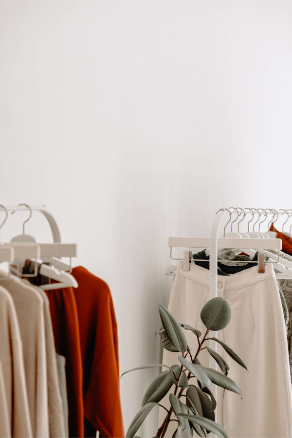 Sustainable fashion image with hangers with eco-friendly clothes