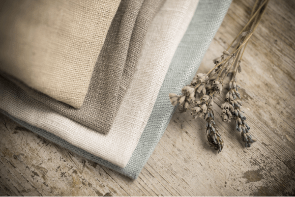 4 cloths made from linen lying on a table