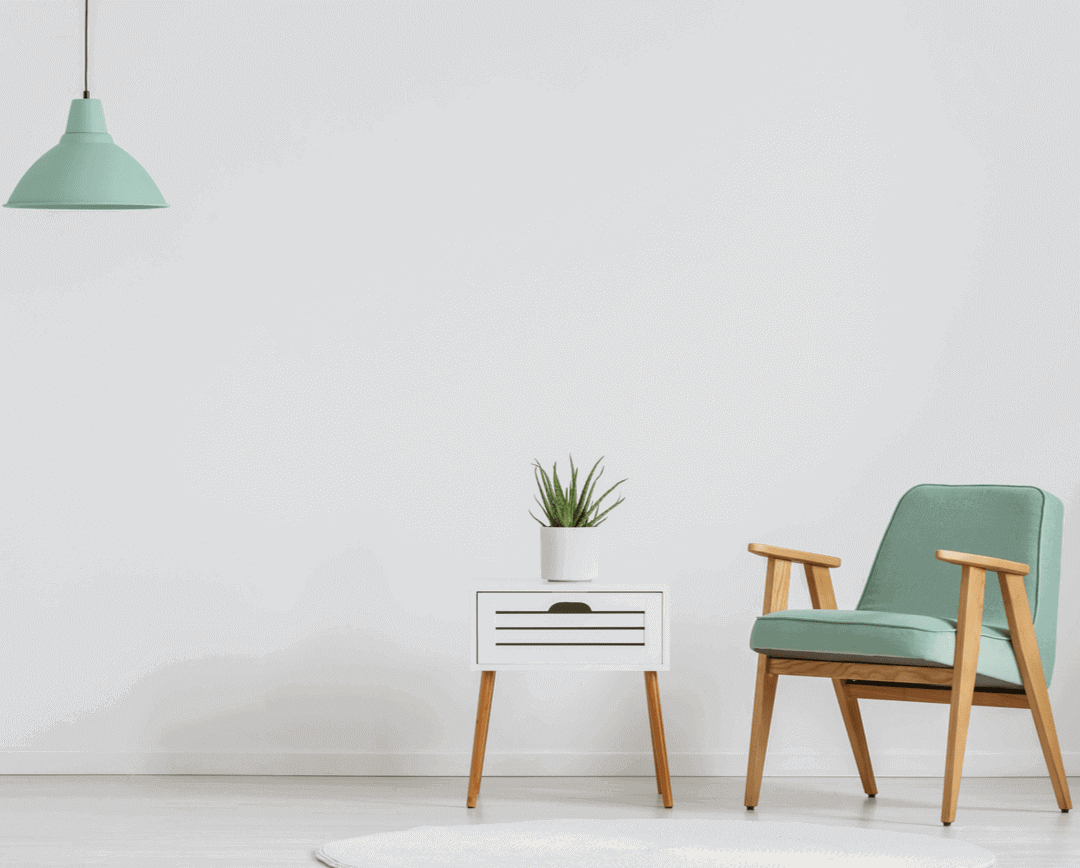 white wooden cabinet with fresh plants and mint shade